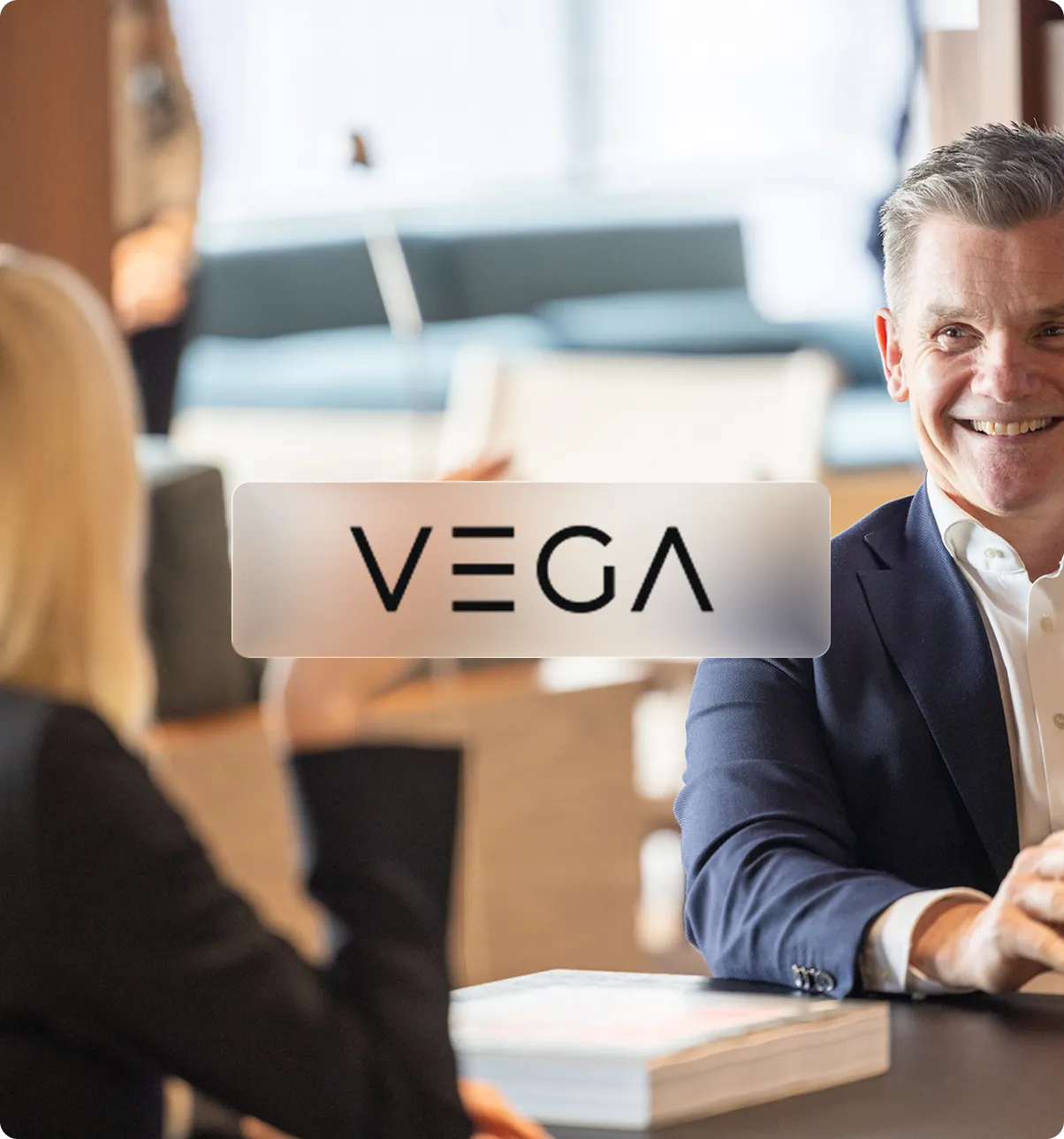 Vega logo on a background photo