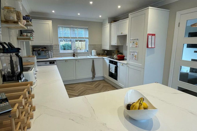 Kitchen renovation with breakfast bar and built in appliances in Somerset