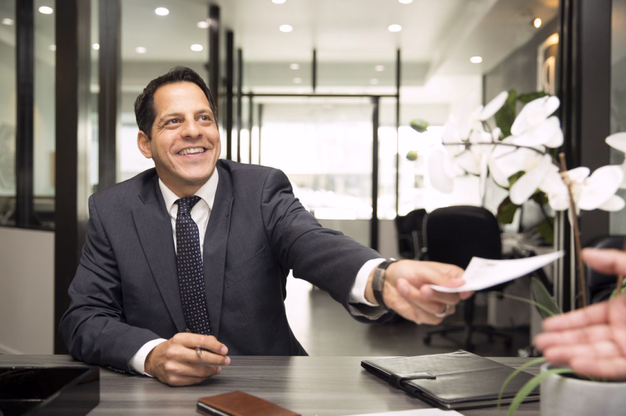 Kermani LLP attorney meeting with a client