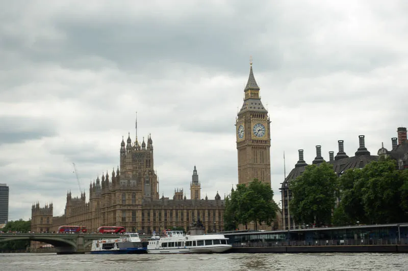 A large clock tower towering over the city of london