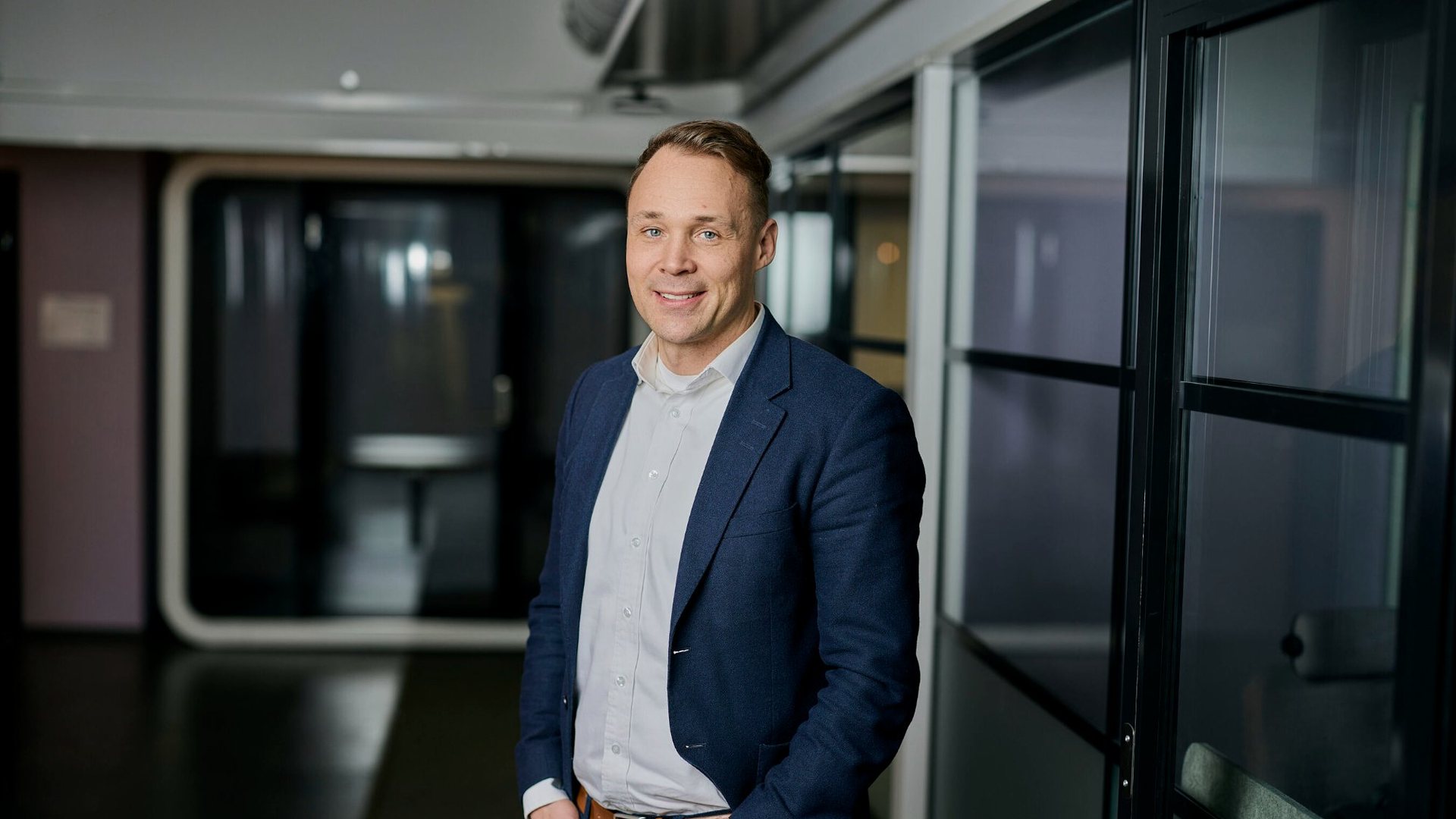 Hannu-Tapani Leppänen, founder and CEO of Aibidia, standing in the Aibidia office