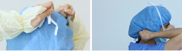 medical professional breaking top and bottom ties of a PRIMED surgical tie face mask to begin doffing the mask