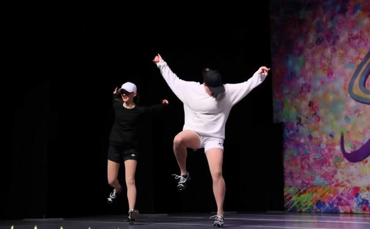 two girls dancing at competition