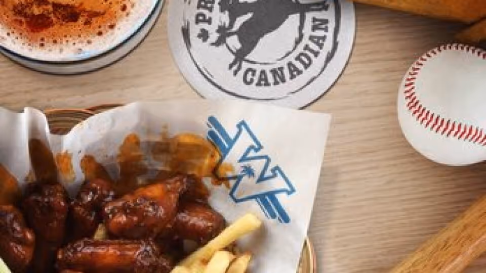 Photo of wild wing wings on a table with a baseball