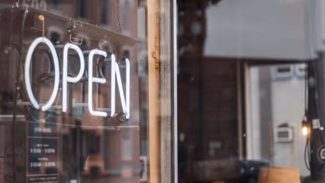 Neon open sign in window