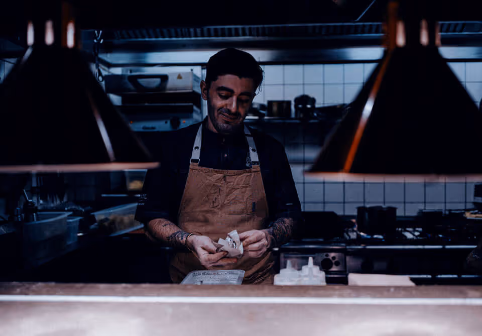 Chef prepping food in kitchen