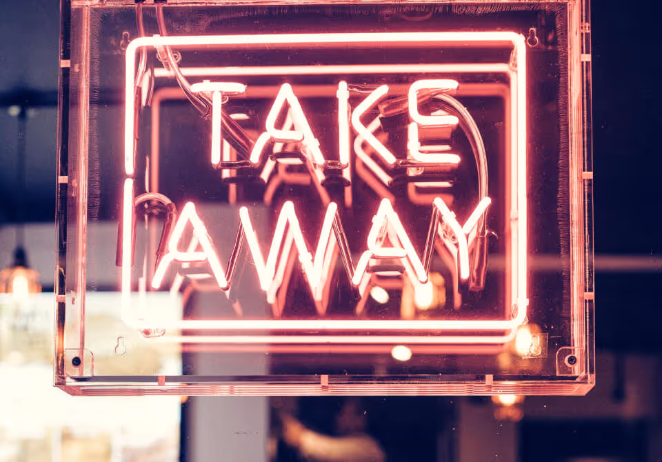Bright neon take away sign
