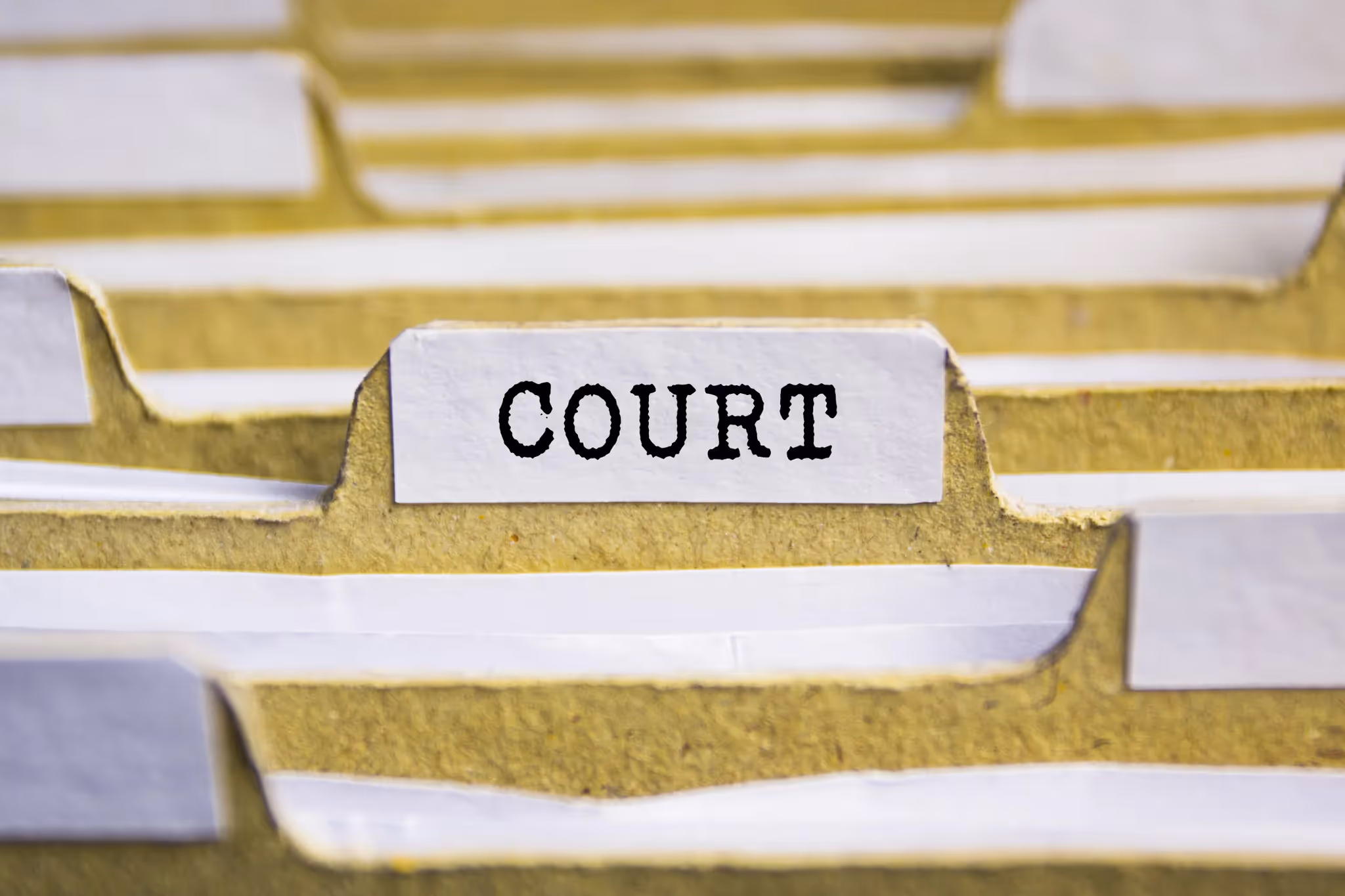 Folder labeled court related to a wrongful death lawsuit