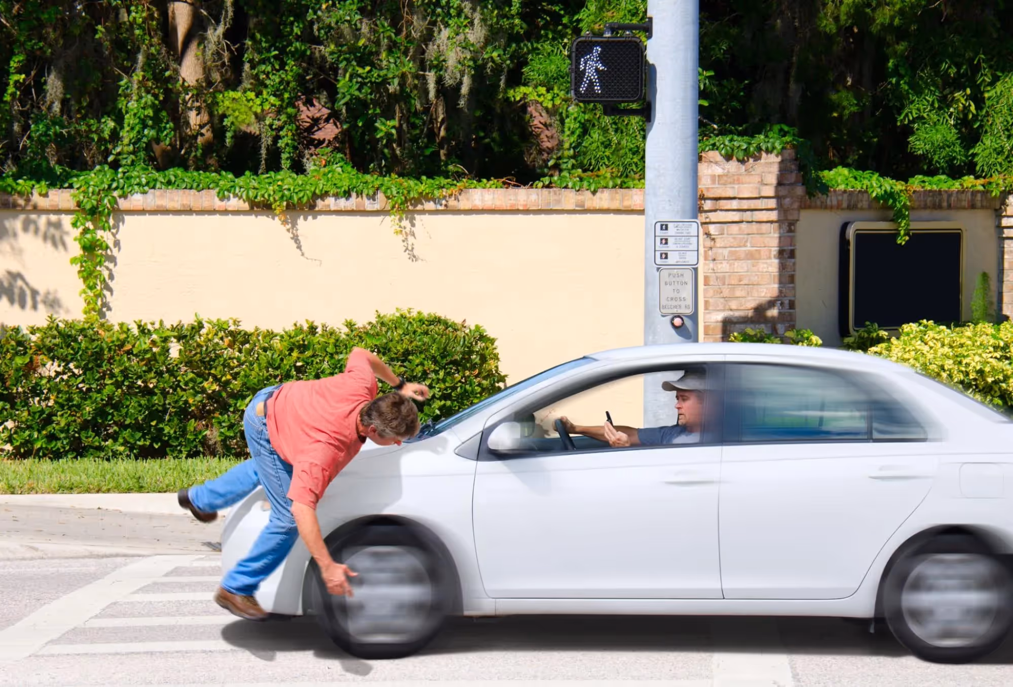 White car hits a pedestrian in a California crosswalk