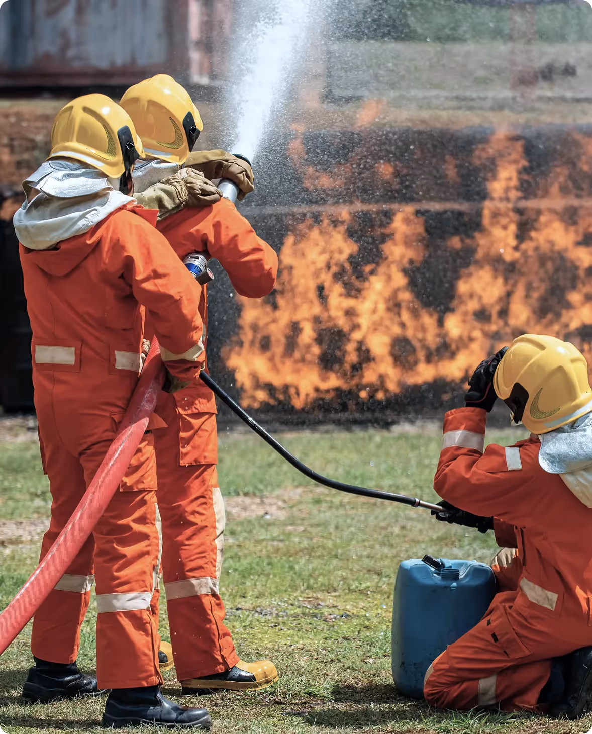 Firefighters putting out flames after a fire incident