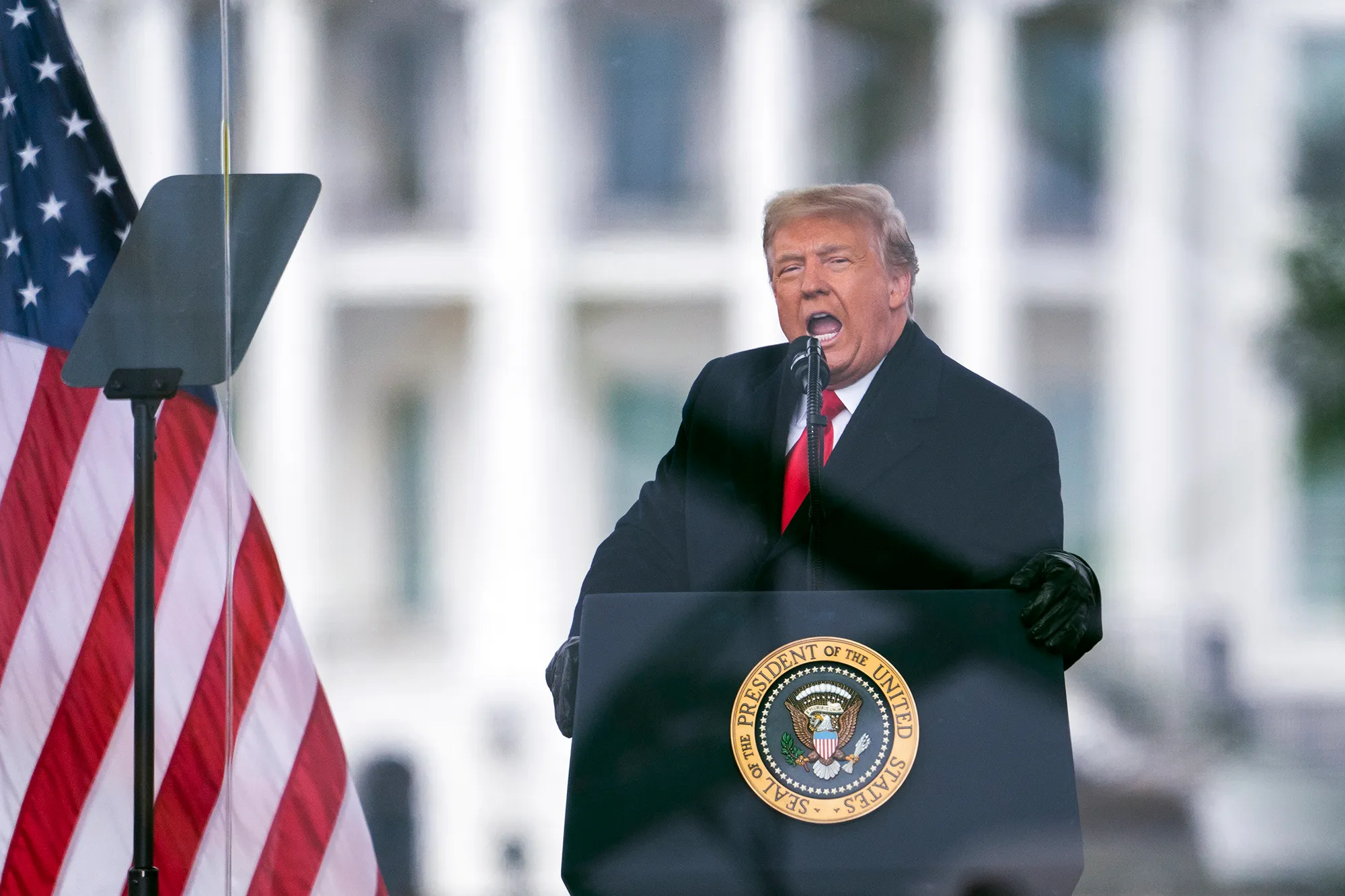 Former President Donald Trump giving a speech.