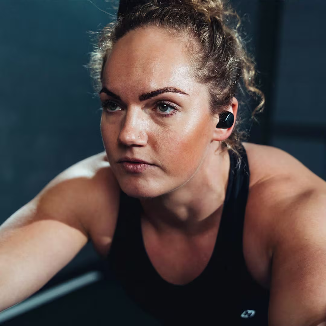 Tzuka TZ7 Ultra Stealth Black in Female Athlete Ear