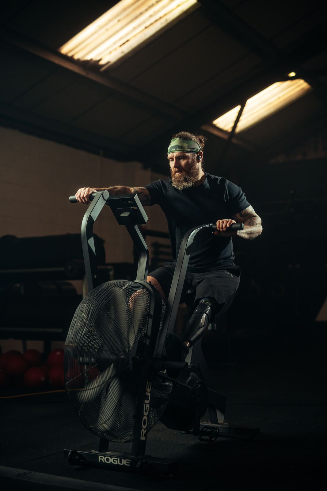 Athlete working hard on the echo bike during a long training session