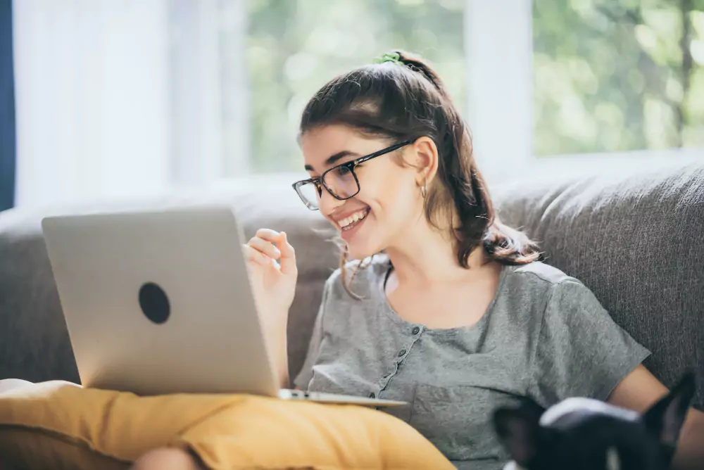 Businesswoman using laptop to work from home
