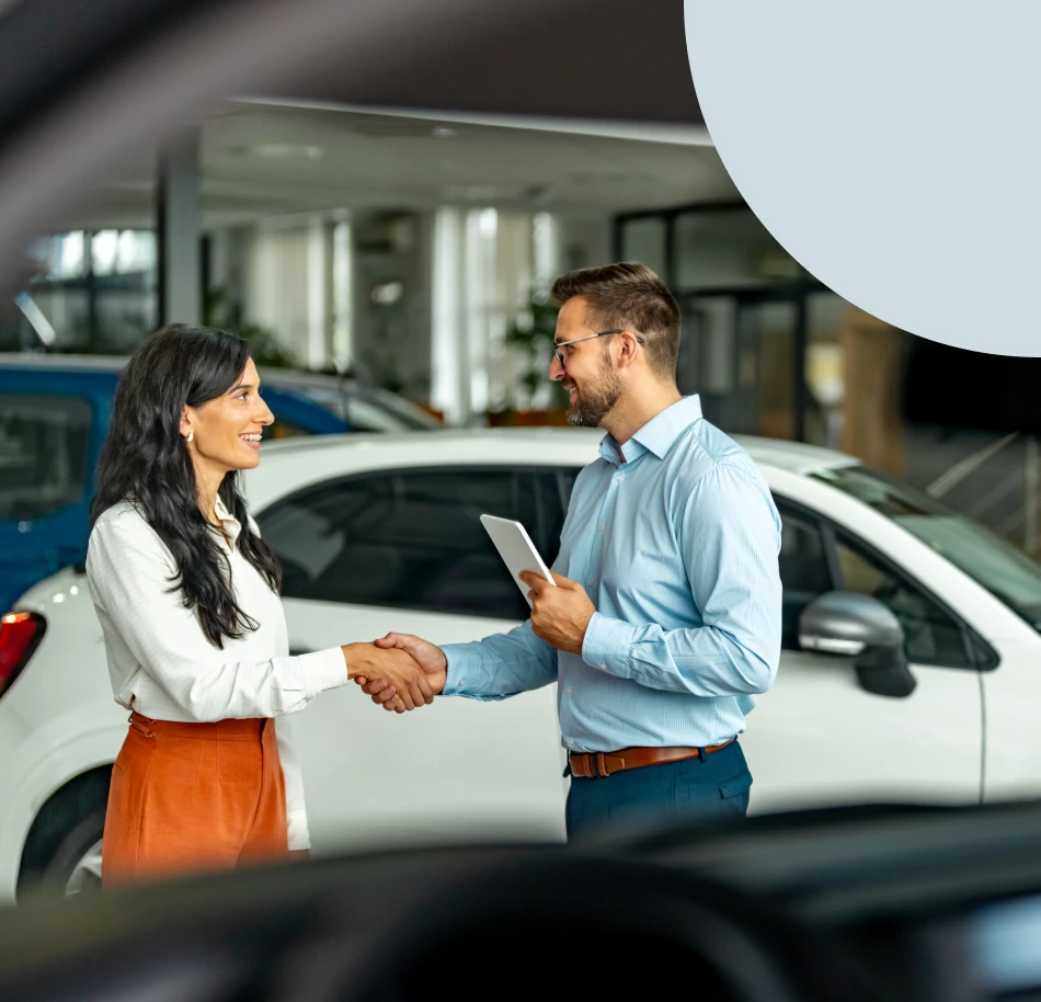 A woman and man shaking hands