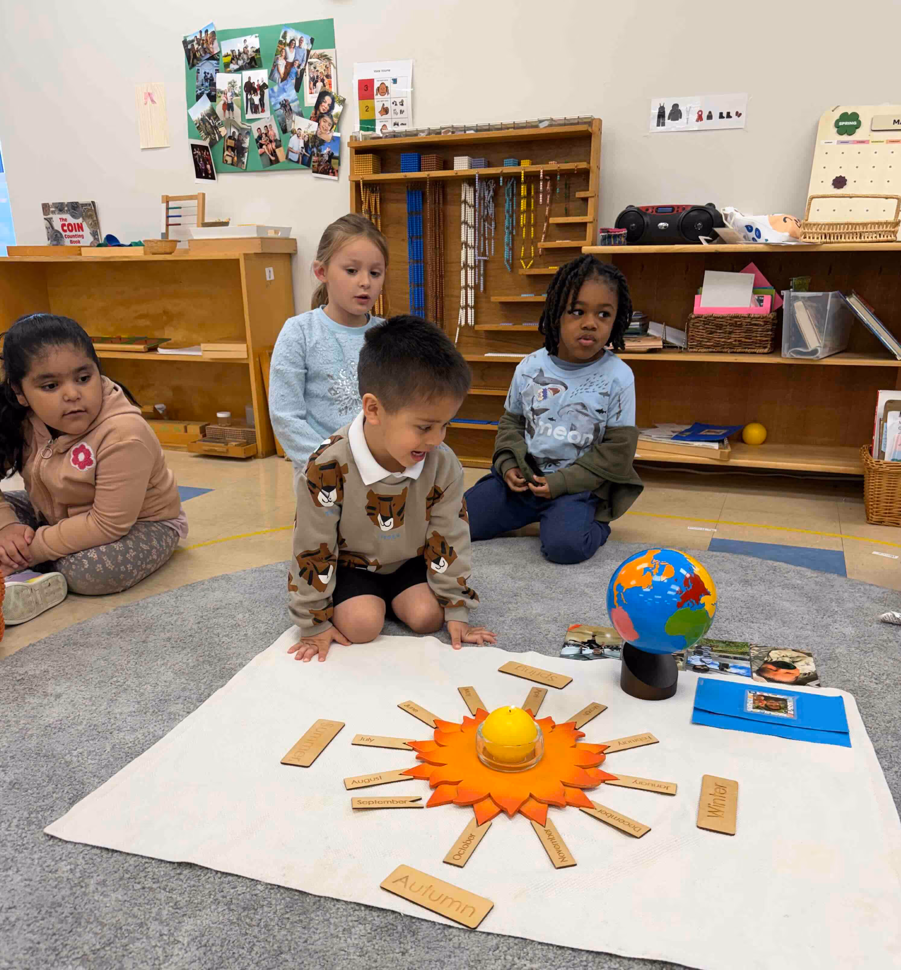 fox-valley-montessori-school-students-working-together-and-learning-about-earth