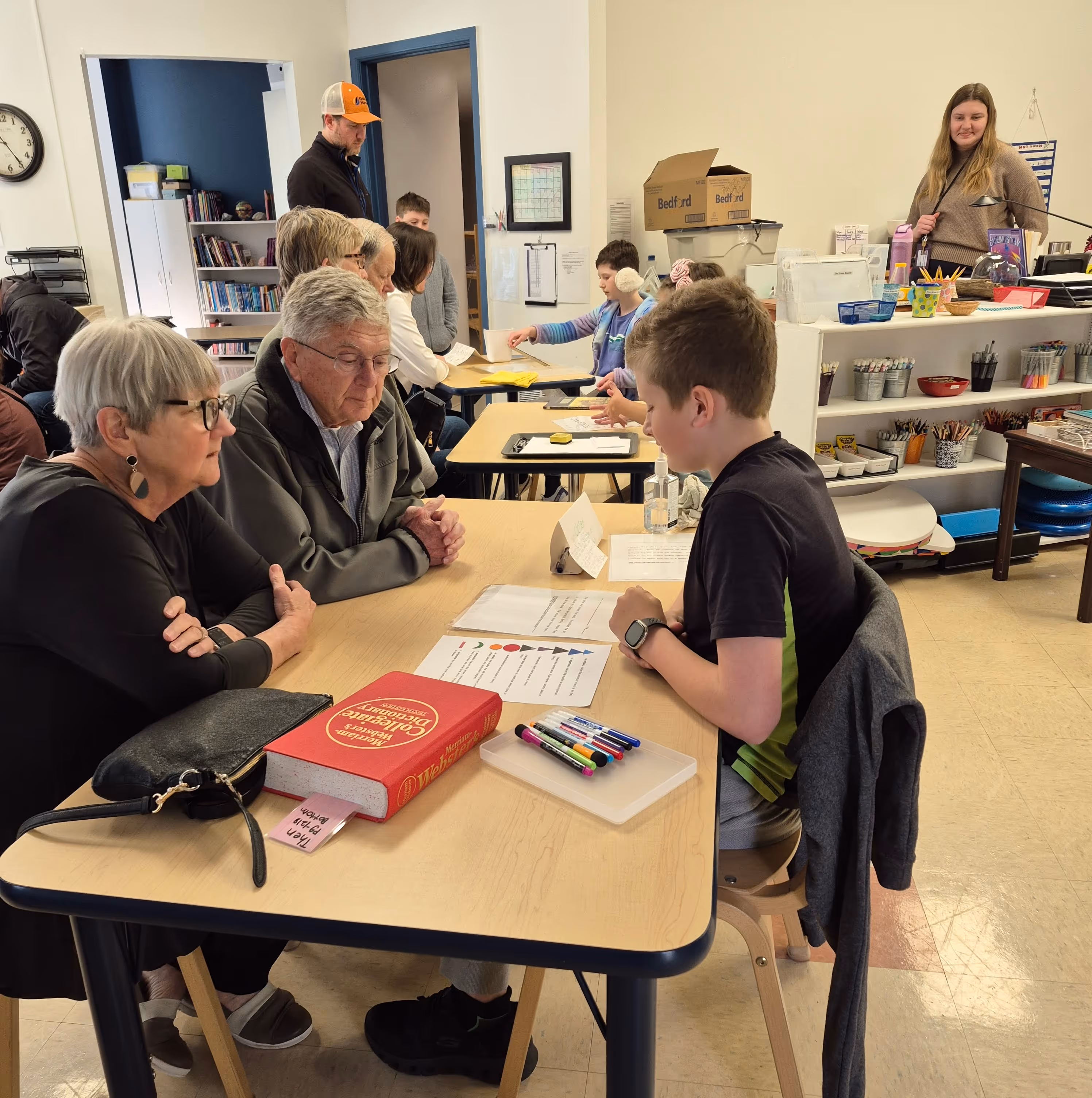 fox-valley-montessori-school-student-presenting-to-parents
