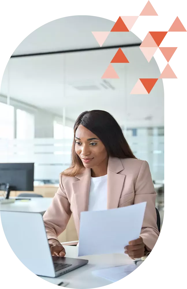 Black woman working at a laptop