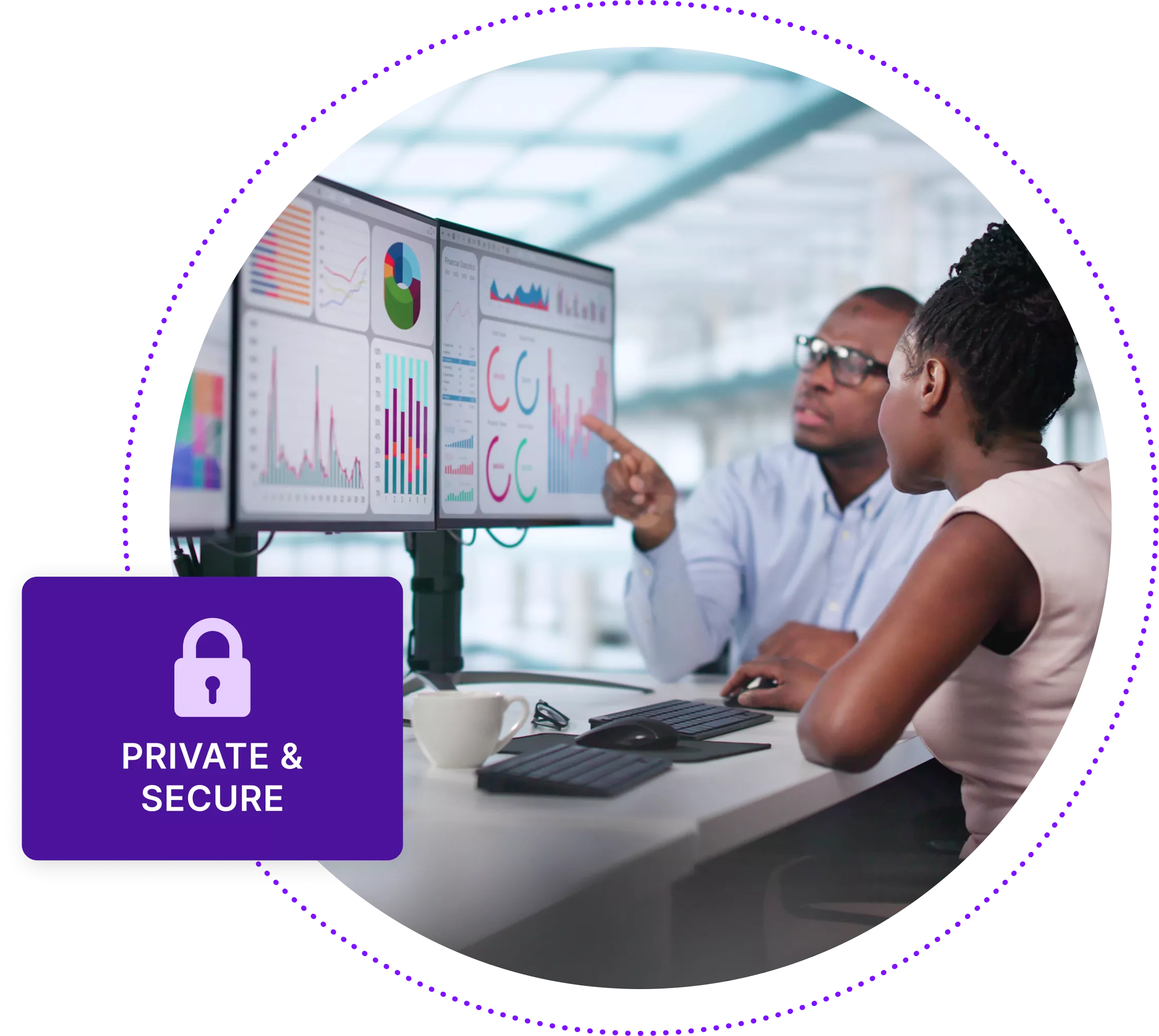 Two coworkers looking at computer screens with complex data