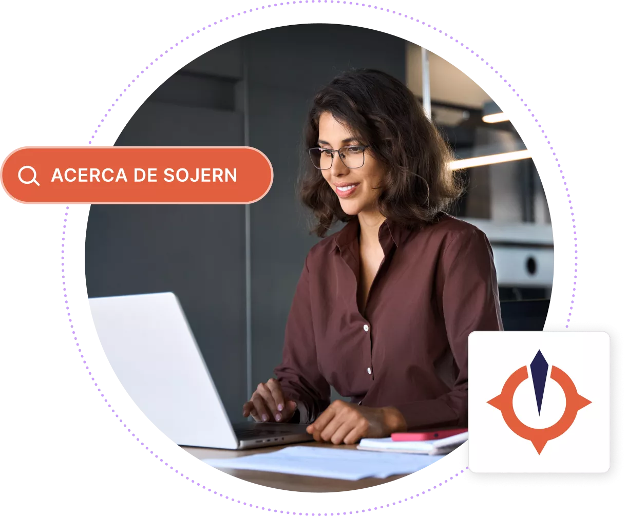 Mujer de negocios escribiendo en una computadora portátil