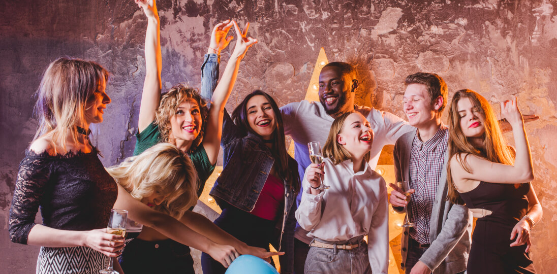 Group celebrating together at an indoor social gathering