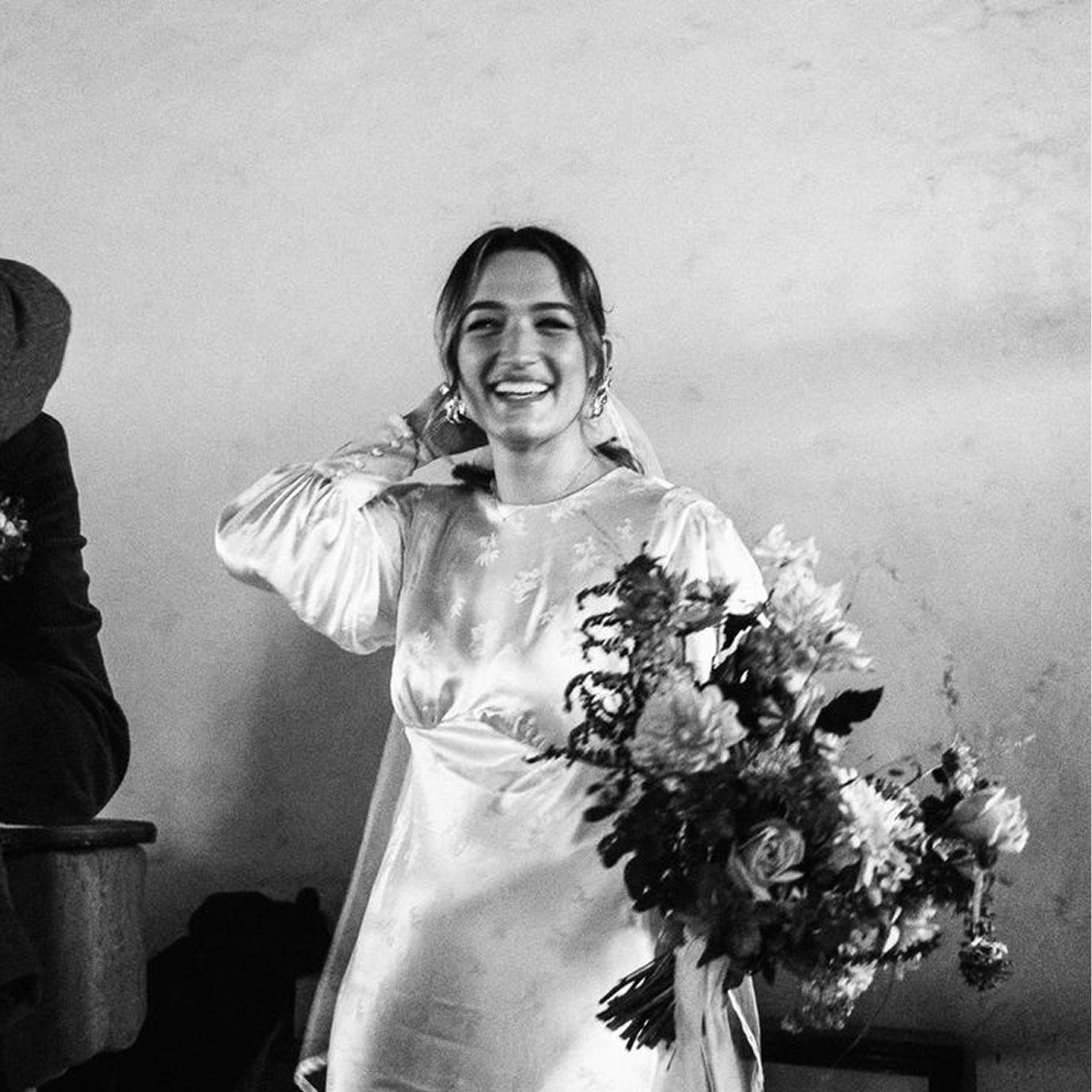 Liam warmly embracing a guest, an emotional moment of connection.