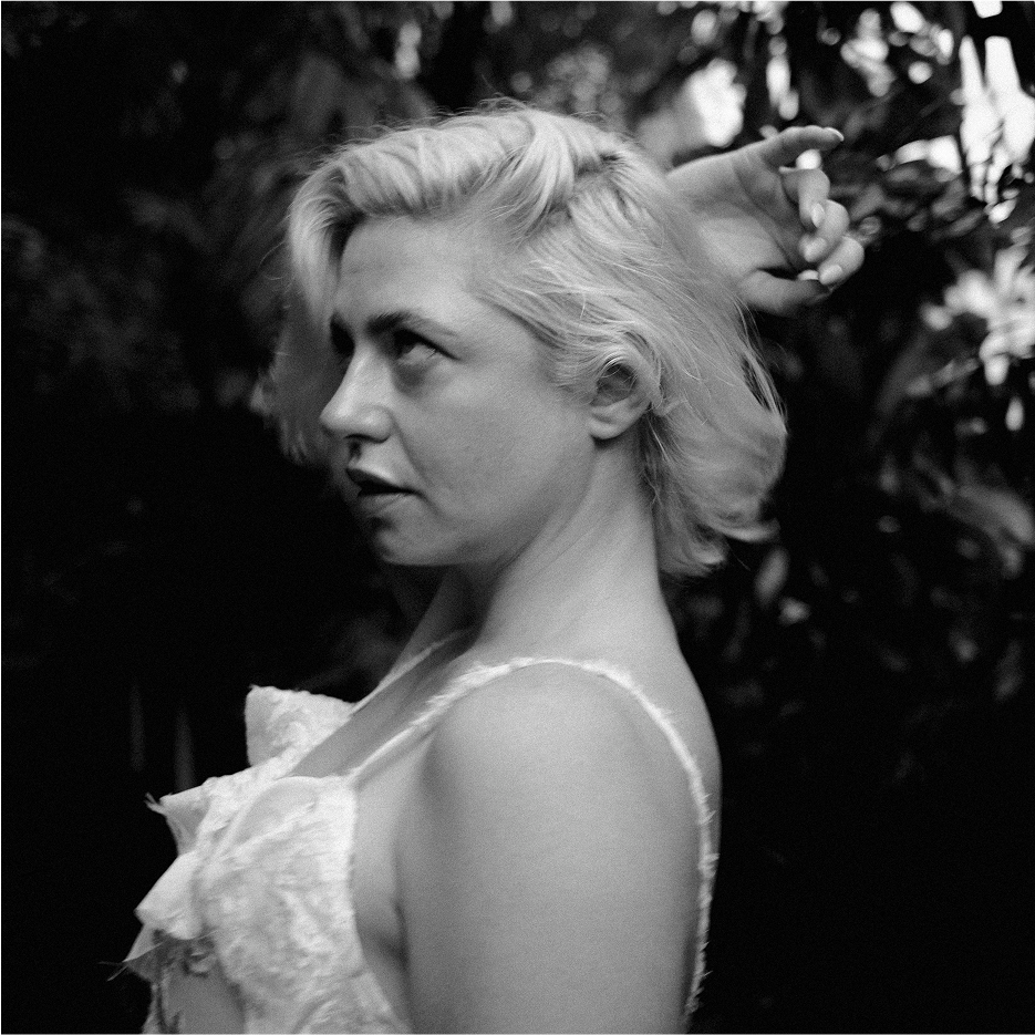 Black and white close-up portrait of Bonnie, reflective mood, fine art portraiture in London.