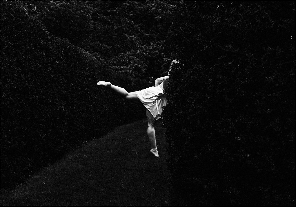 Outdoor portrait of Bonnie at the Royal Botanic Gardens, Kew, contemplative and balanced, fine art portrait photography.
