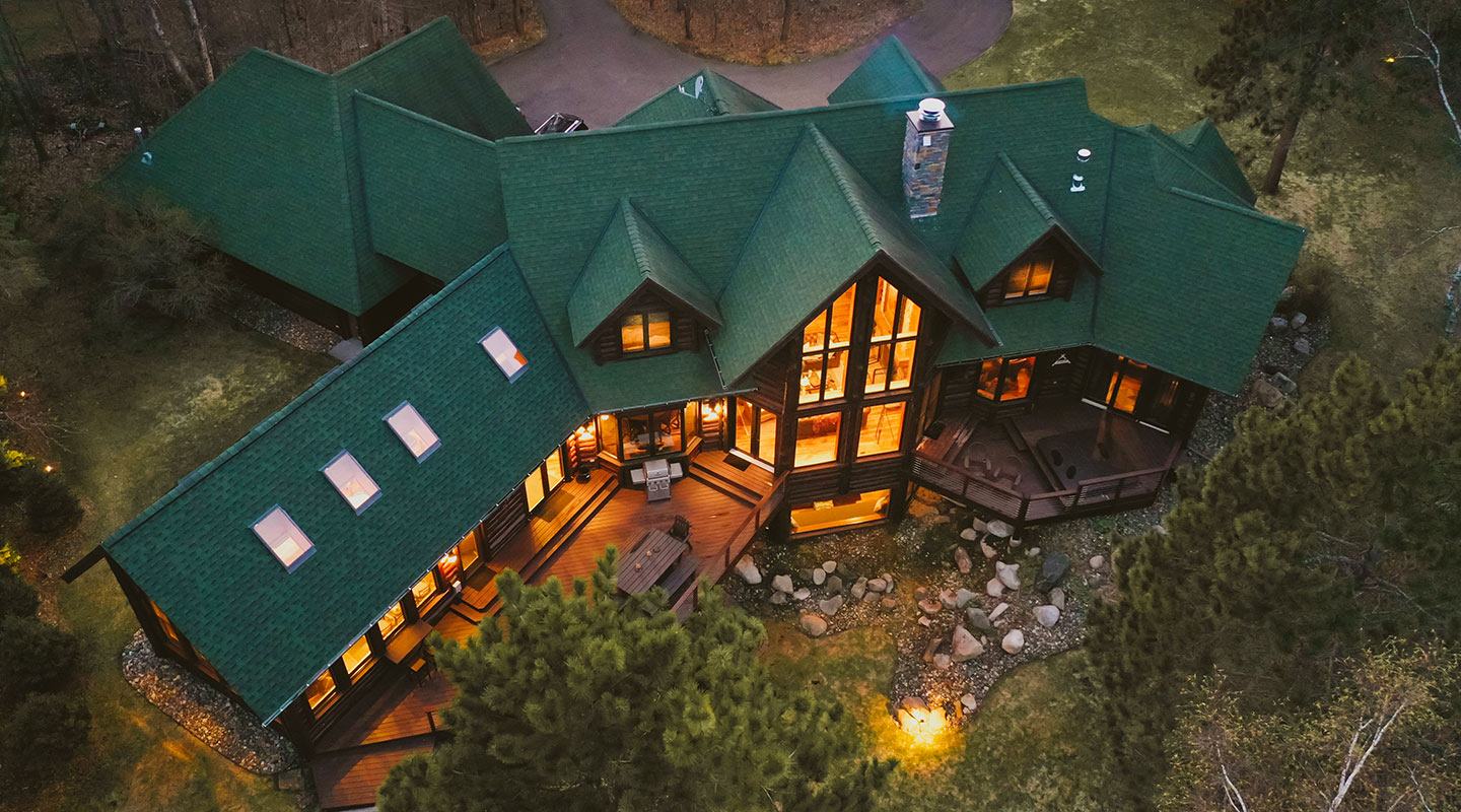 aeriel view of a green roof top house