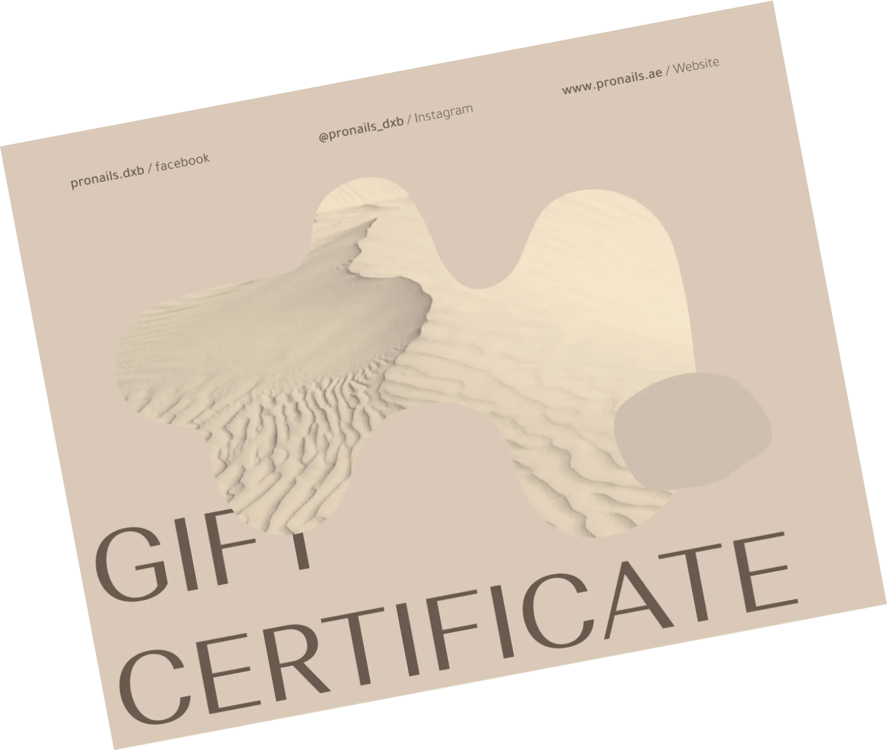 Gift certificate with a sand dune photo in an abstract shape and website and social media info.