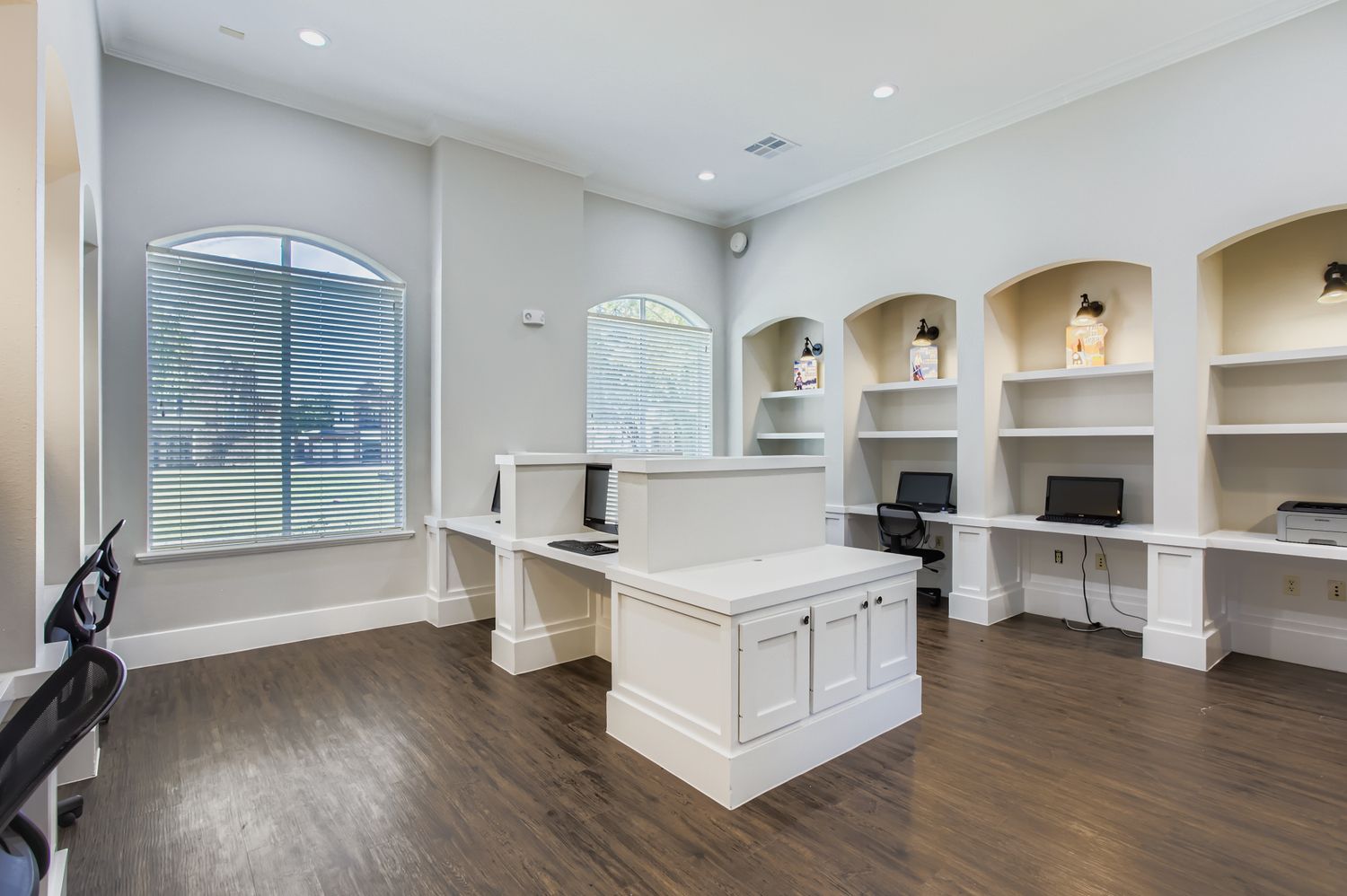 media room with computers and desks