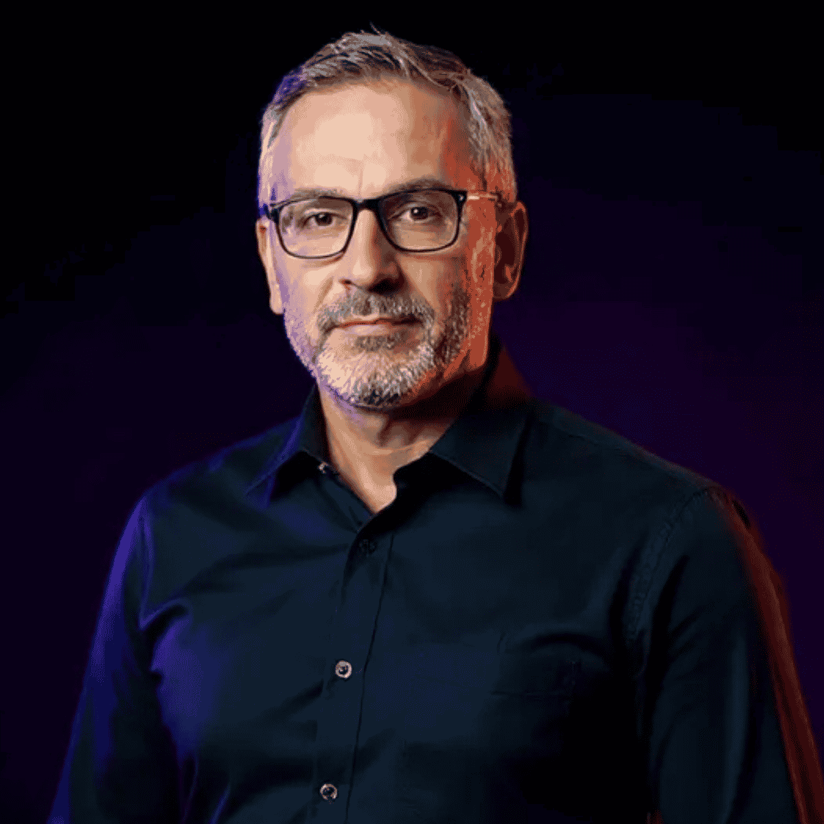 A man wearing a black shirt.