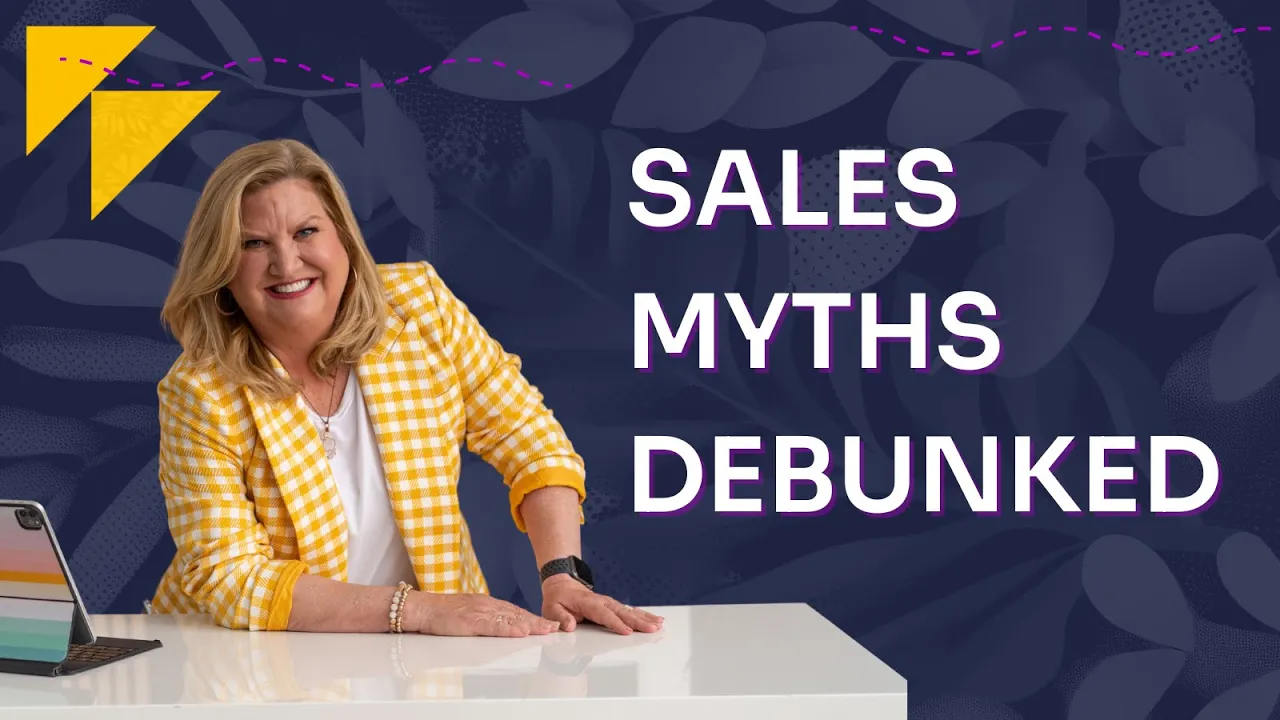 A woman in a yellow and white checkered suit against a blue background.