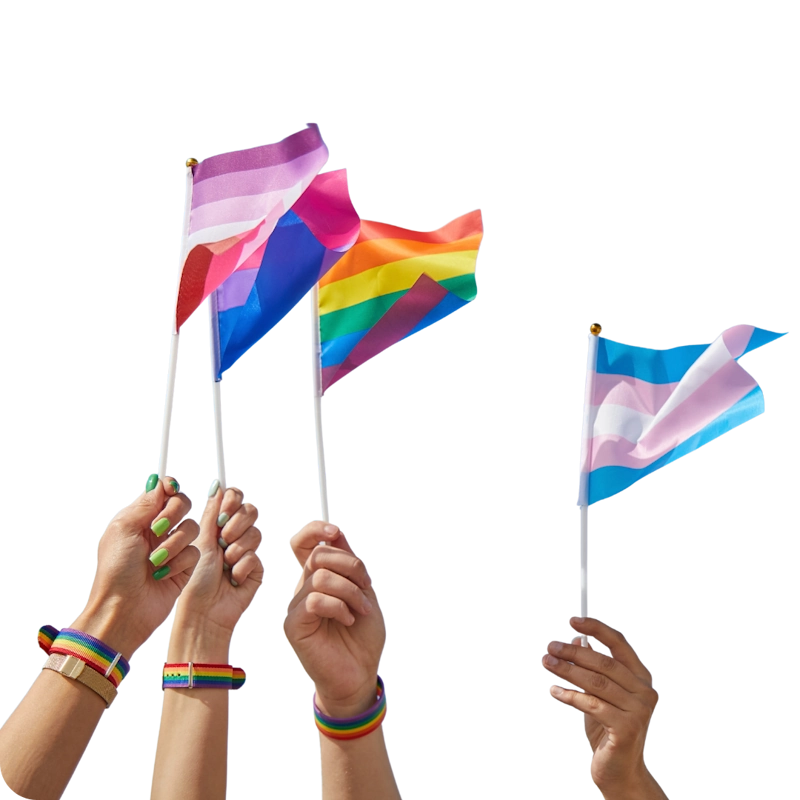 Hands holding flags representing the bisexual, rainbow, and transgender pride communities, symbolizing support and inclusivity, set against a black background, aligned with the theme of gender-affirming care at ART Surgical.