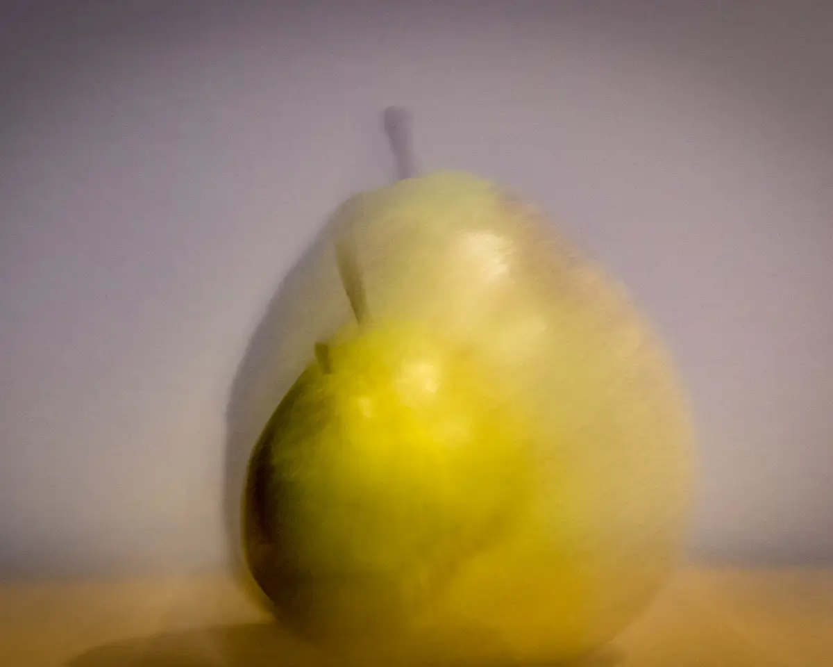 intentional camera movement to create the illusion of multiple pears