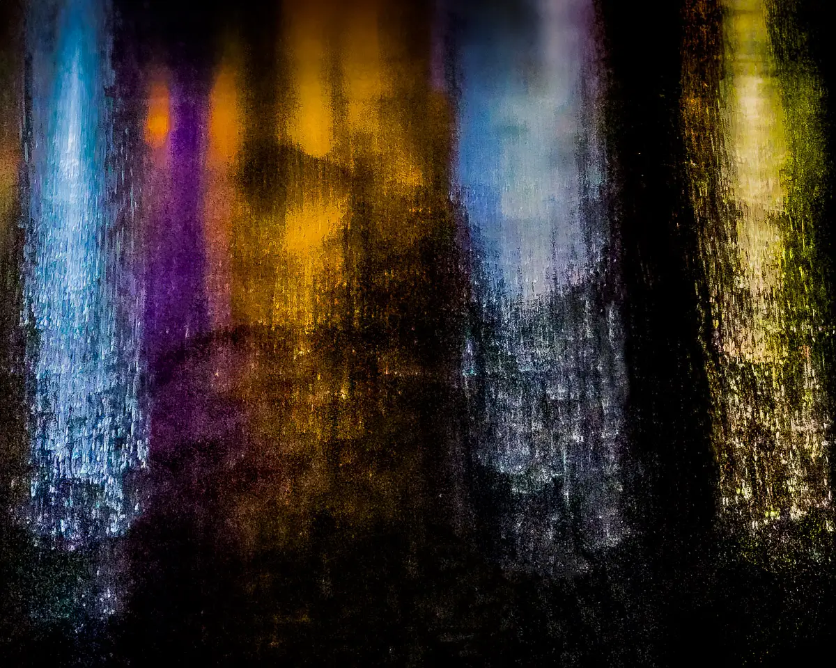 reflection of lights in water in Italy, resulting in colored splashes