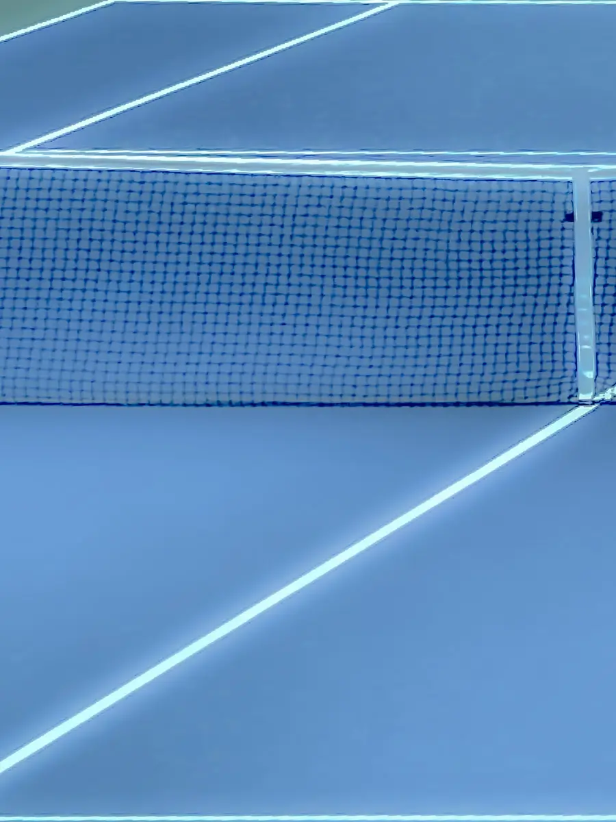 zooming in on a tennis court showing a pattern of lines with the boundary lines and net