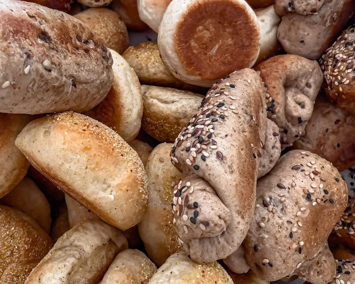 close up of a pile of bread rolls