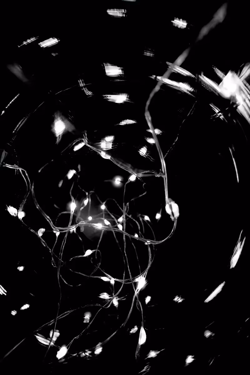 abstract of string lights creating a spinning vortex