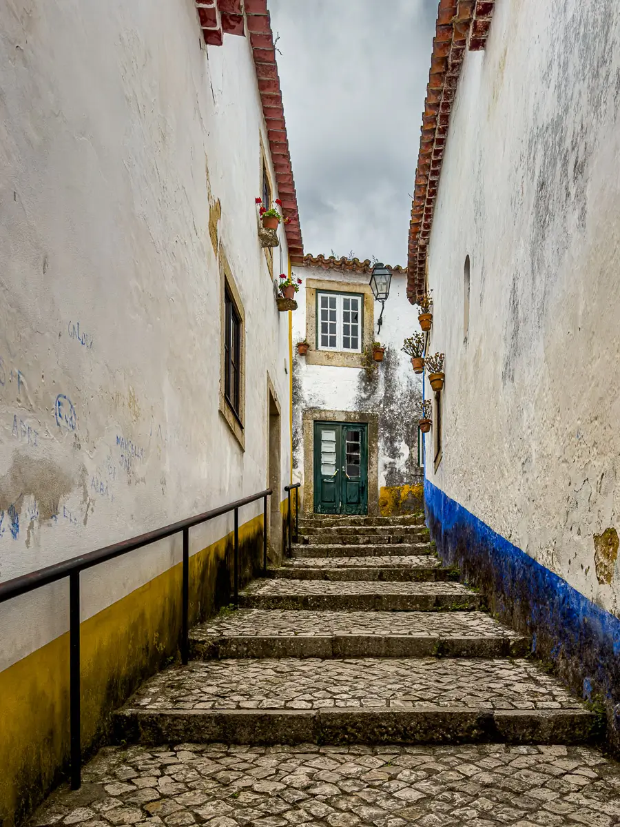 Portugal: long path up gradual stairs, getting narrow