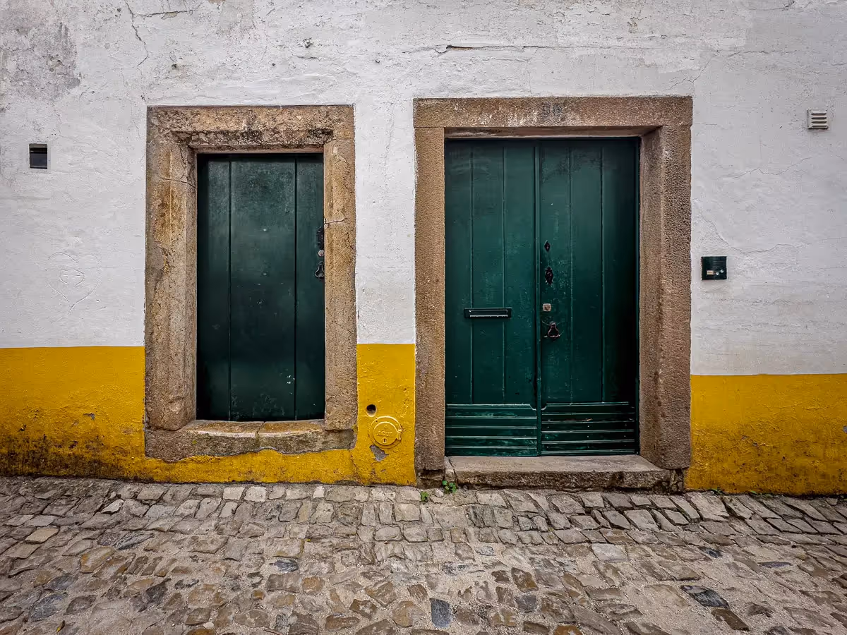 Portugal: green doors of different sizes