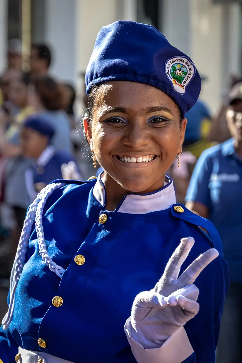 Colombia Independence Day Parade: girl with peace sign