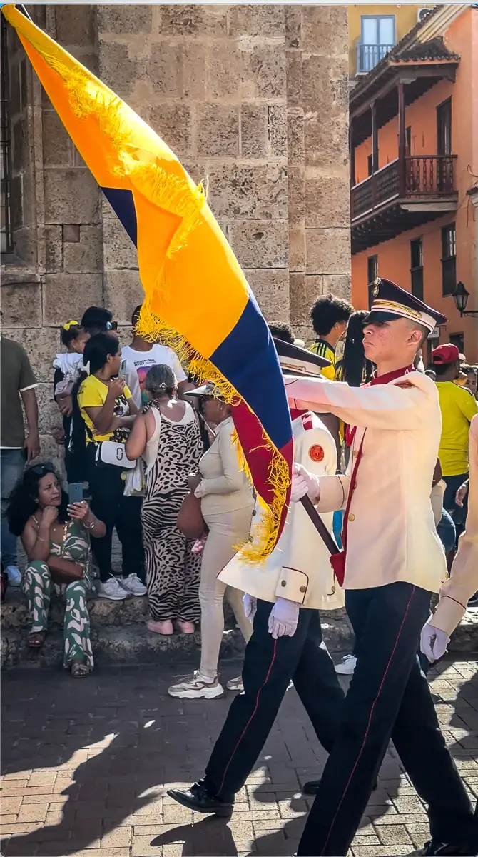 Colombia Independence Day Parade: boy holding flag