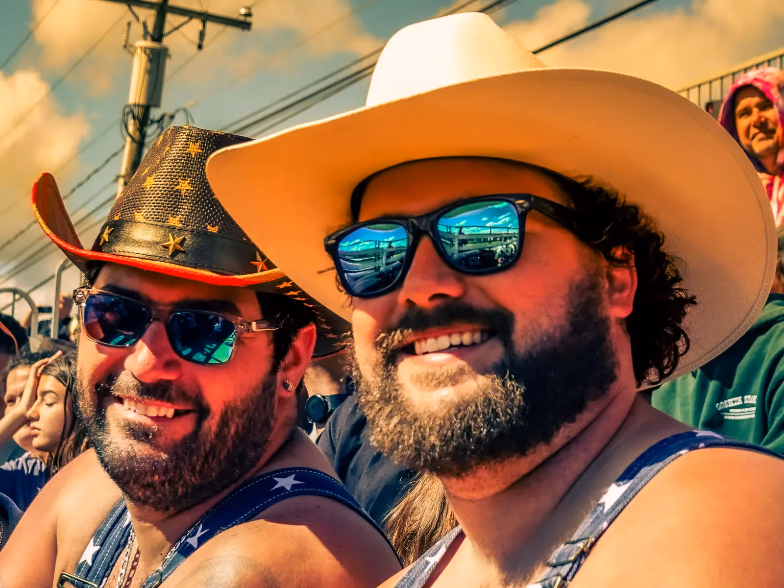 Goshen NY Rodeo: men in cowboy hats watching