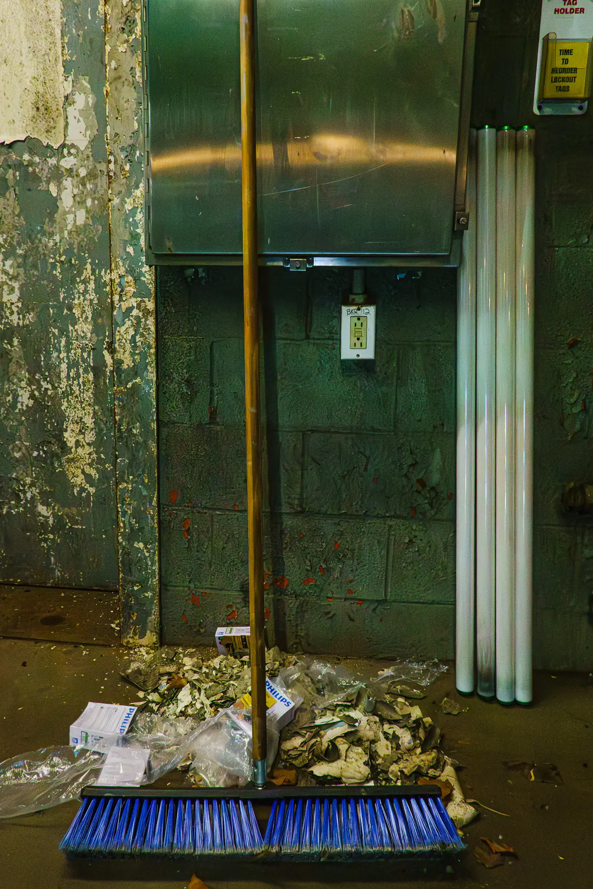 Manresa Island Power Plant: abstact, rust, peeling paint, shadows, light, broom with garbage