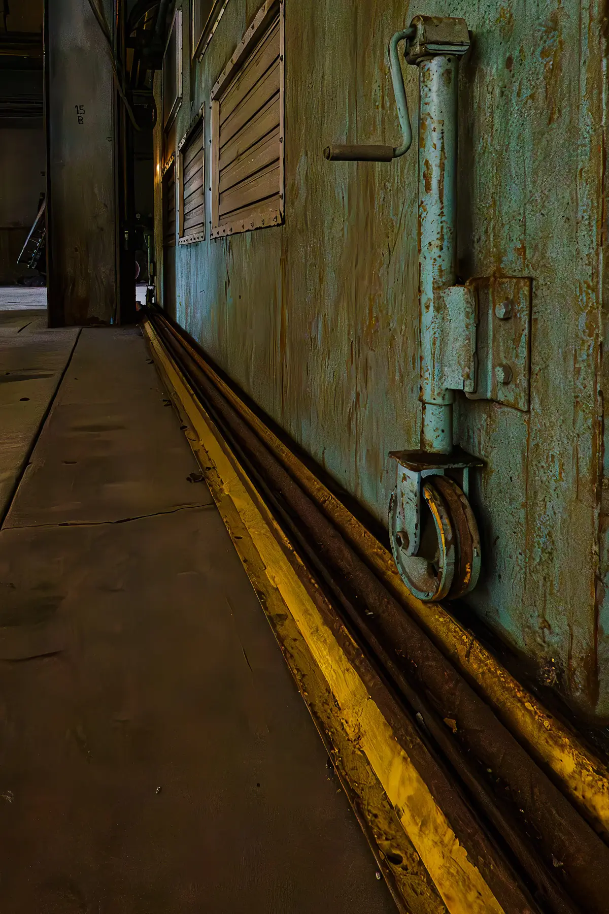 Manresa Island Power Plant: abstact, rust, peeling paint, shadows, light, wheel on track
