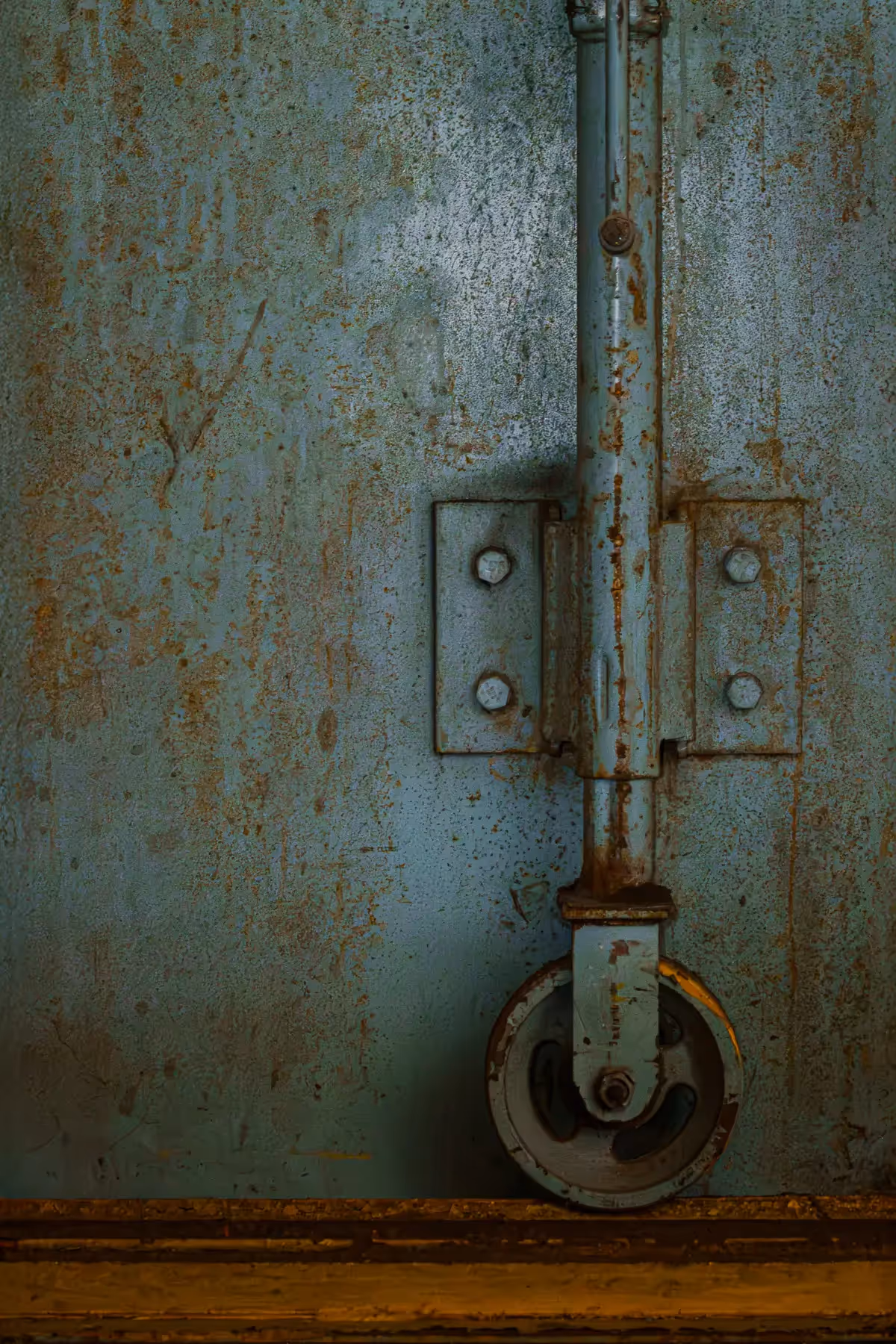 Manresa Island Power Plant: abstact, rust, peeling paint, shadows, light, wheel on track