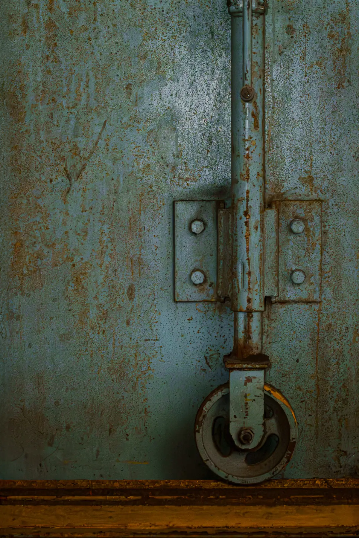 Manresa Island Power Plant: abstact, rust, peeling paint, shadows, light, wheel on track