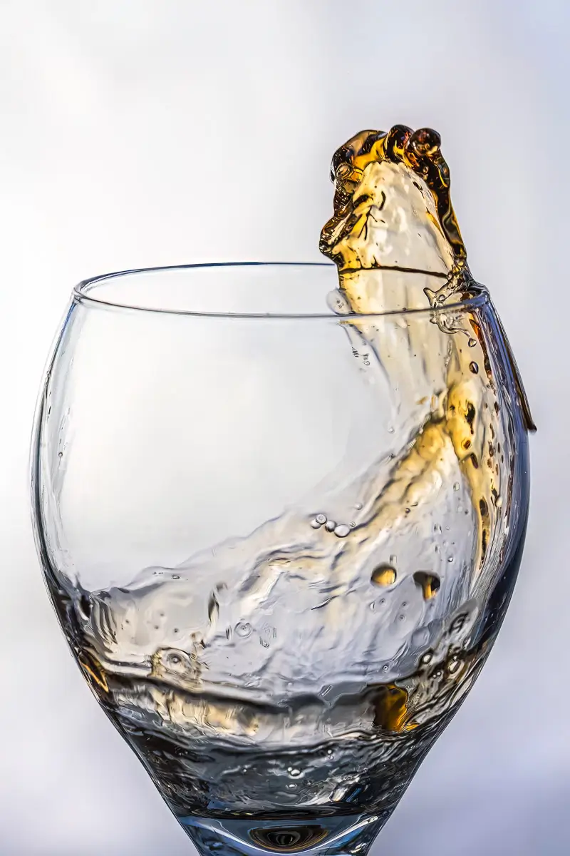 cranberry juice splash in wine glass