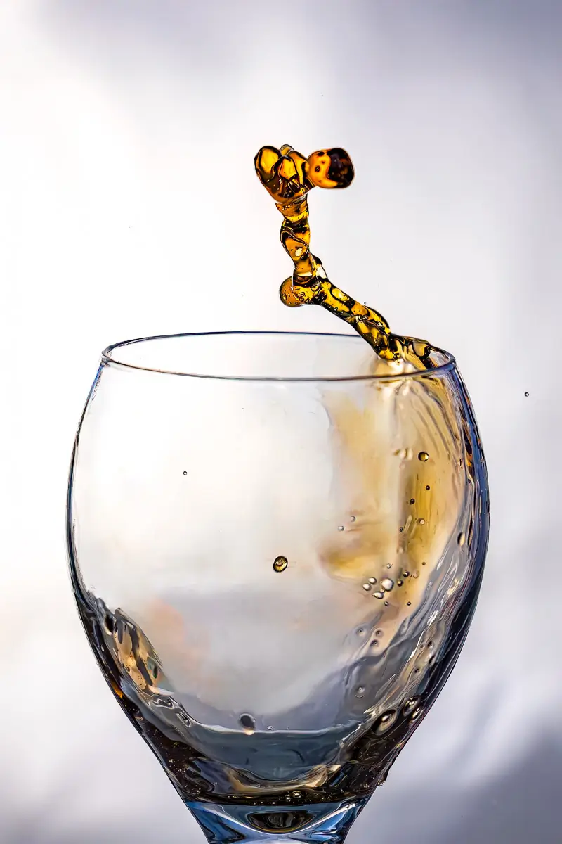 cranberry juice splash in wine glass